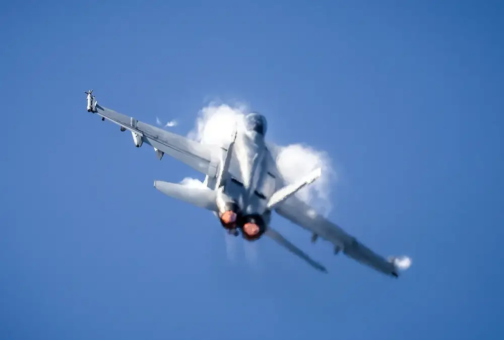 Military jet performing maneouvers