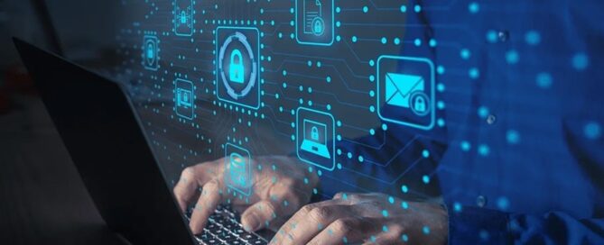 Man using laptop with cyber security icons superimposed
