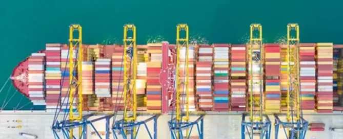 Birds eye view of a shipping container being unloaded