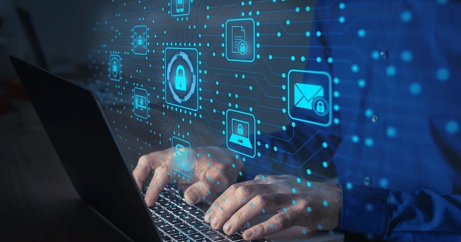 Man using laptop with cyber security icons superimposed