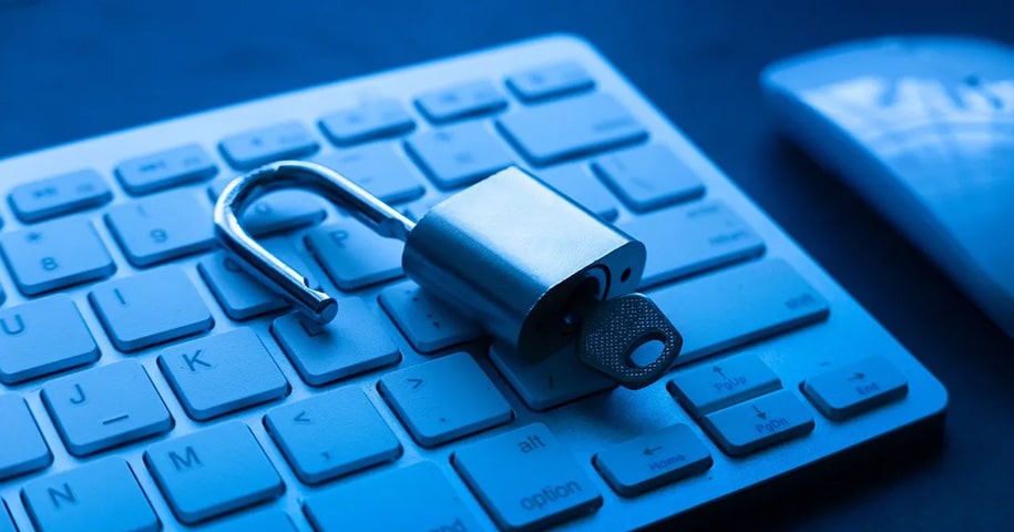 Padlock unlocked on top of a keyboard