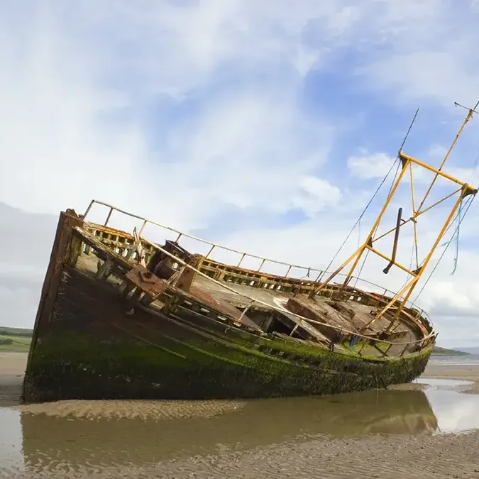 Beached ship on the sand