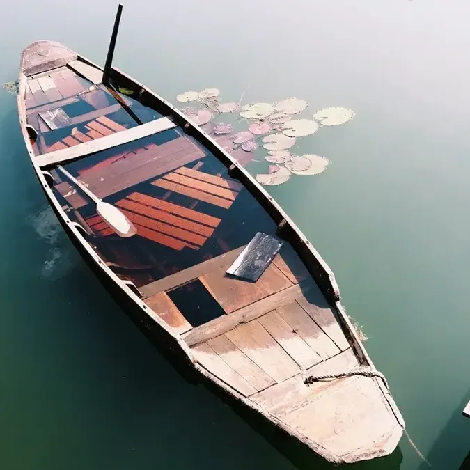 Unattended boat on water filled with water